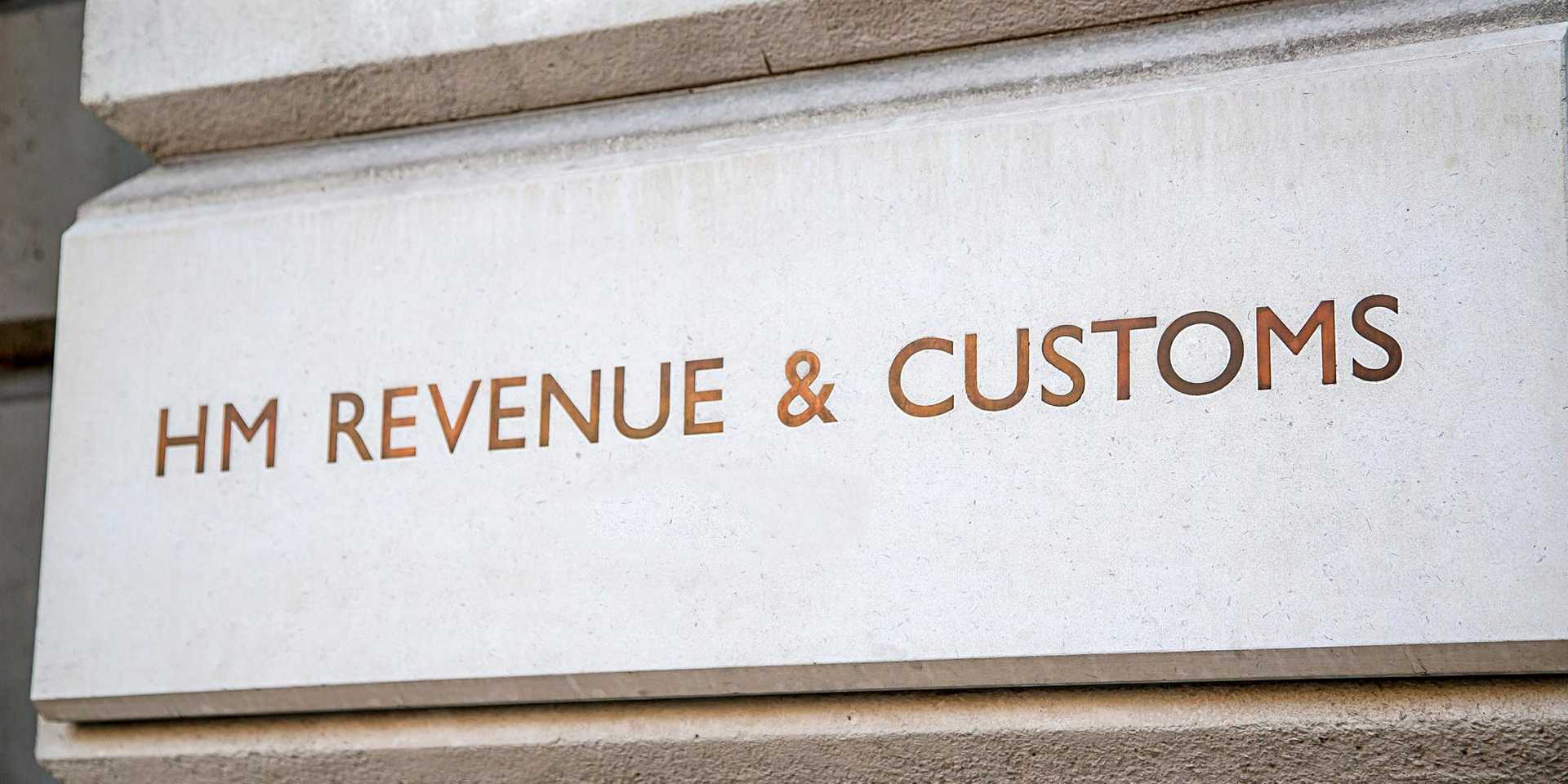 HM Revenue & Customs written in stone on their building entrance