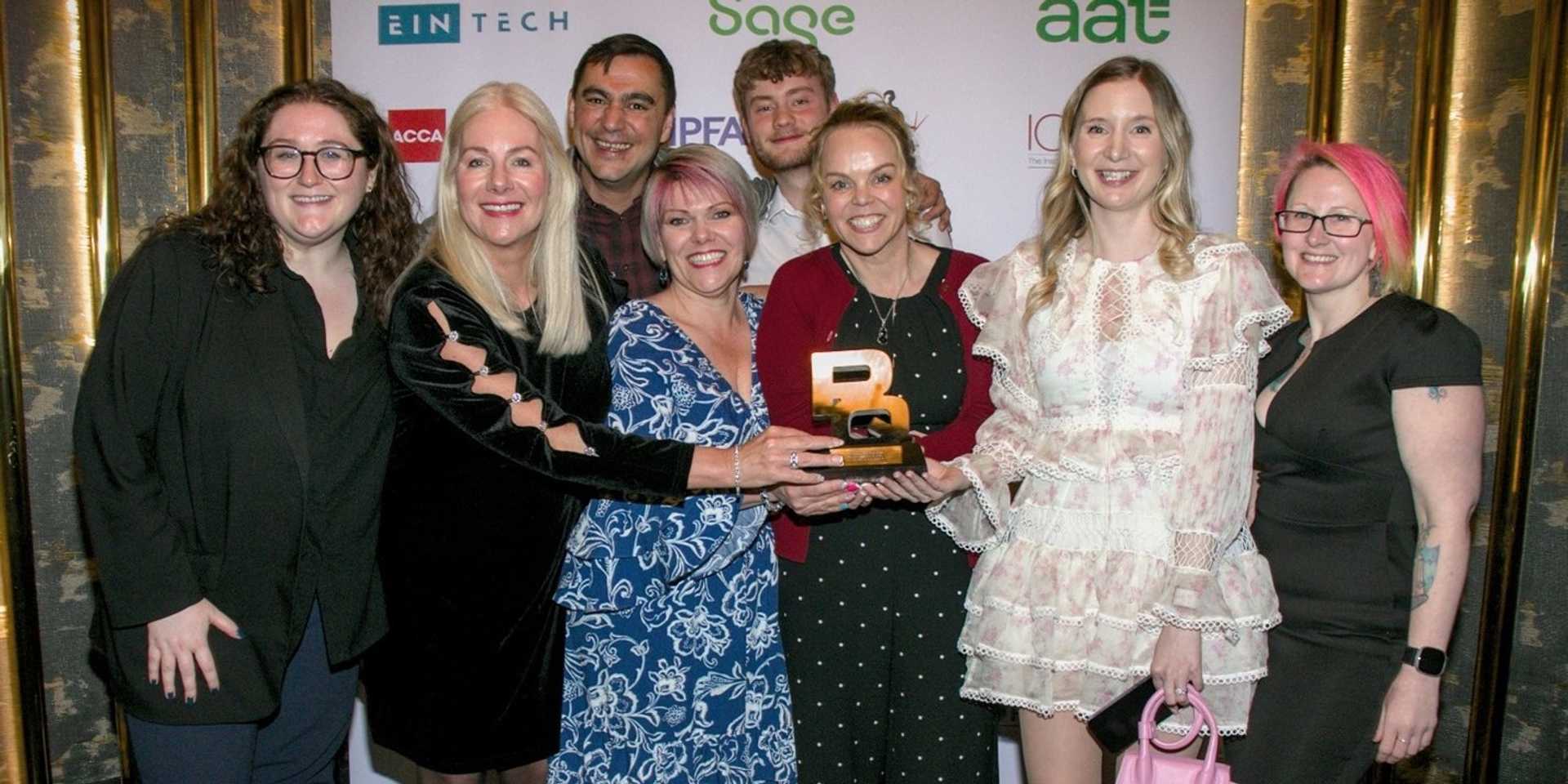 AAT staff celebrating their win at the PQ Magazine Awards
